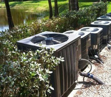 hedges along row of air conditioners